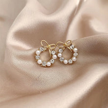 1 pair simple style classic style bow knot plating inlay alloy artificial rhinestones artificial pearls gold plated ear studs