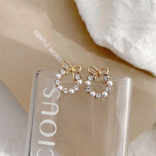 1 pair simple style classic style bow knot plating inlay alloy artificial rhinestones artificial pearls gold plated ear studs